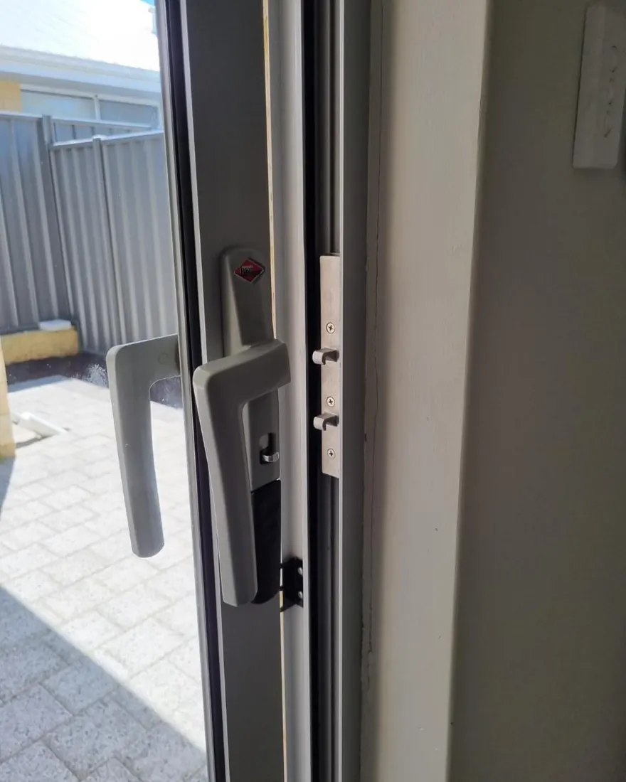 Multipoint lock and handle repaired on an aluminium hinged patio door in Perth