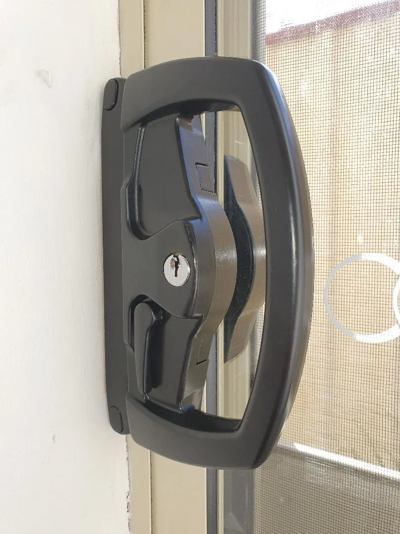 Black keyed sliding security screen door lock fitted on a Perth home