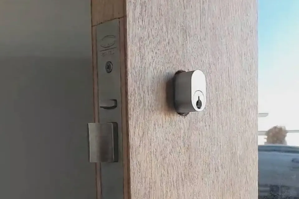 Mortice lock and key cylinder freshly installed in a solid timber entry door in Perth